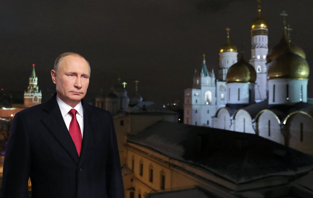 In this photo released by the Kremlin Press service via Sputnik agency, Saturday, Dec. 31, 2016, Russian President Vladimir Putin speaks during an undated recording of his annual televised New Year's message in the Kremlin in Moscow, Russia, . President Vladimir Putin invoked a bit of seasonal enchantment in his New Year's Eve remarks to the nation. The recorded message was being televised just before midnight Saturday in each of Russia's nine time zones.  (Mikhail Klimentyev/Kremlin Press Service, Sputnik, via AP)