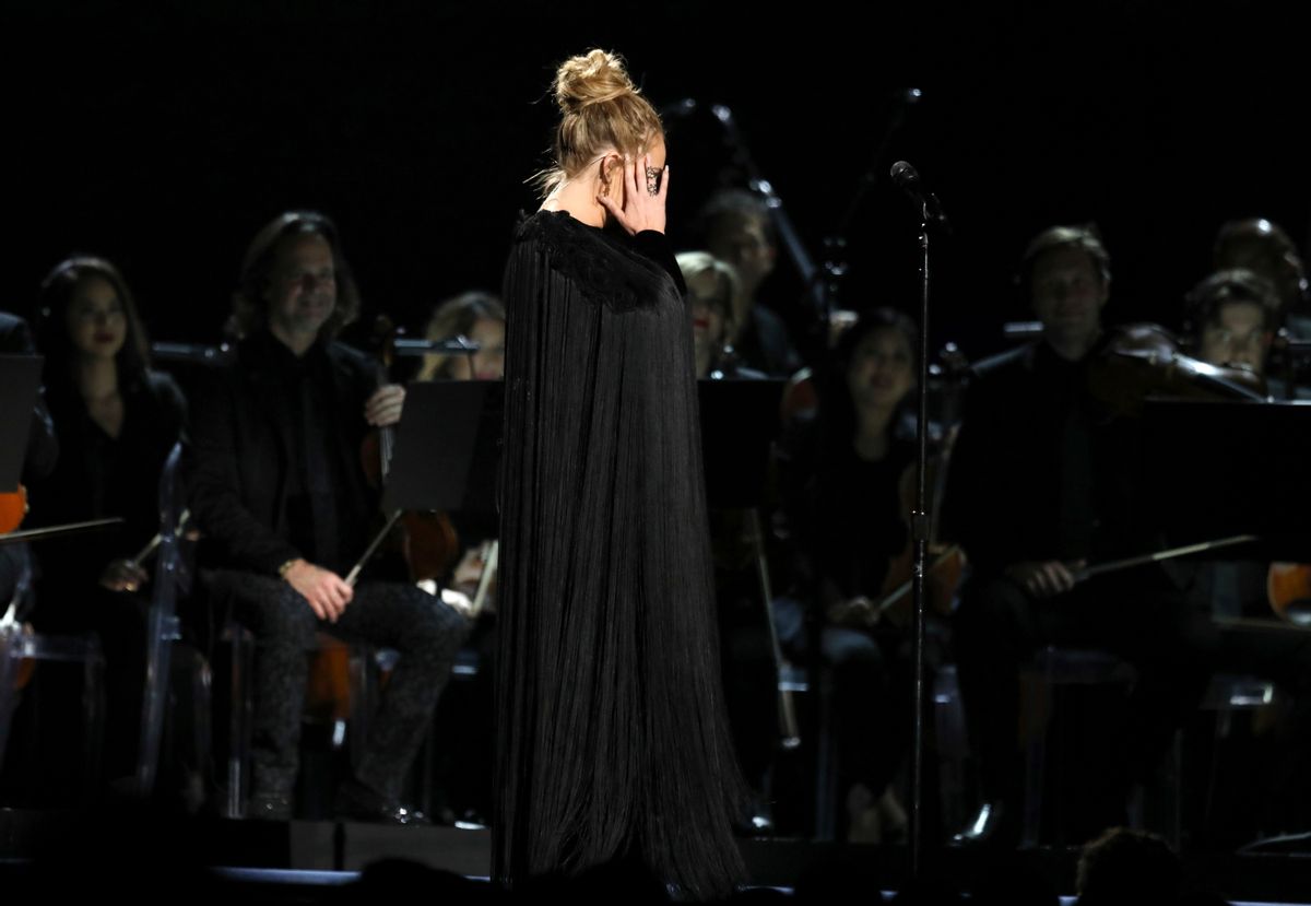 Adele reacts before restarting a performance tribute to George Michael at the 59th annual Grammy Awards on Sunday, Feb. 12, 2017, in Los Angeles. (Matt Sayles/invision/ap)