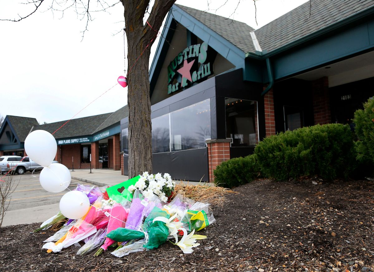 A small memorial for Srinivas Kuchibhotla is displayed outside Austins Bar and Grill in Olathe, Kan., Friday, Feb. 24, 2017. Kuchibhotla was shot and killed at the bar Wednesday, Feb. 22. (AP Photo/Orlin Wagner) (AP Photo/Orlin Wagner)