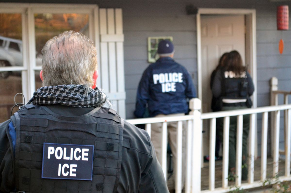 In this Feb. 9, 2017, photo provided U.S. Immigration and Customs Enforcement, ICE agents at a home in Atlanta, during a targeted enforcement operation aimed at immigration fugitives, re-entrants and at-large criminal aliens. The Homeland Security Department said Feb. 13, that 680 people were arrested in roundups last week targeting immigrants living illegally in the United States. (Bryan Cox/ICE via AP) (AP)