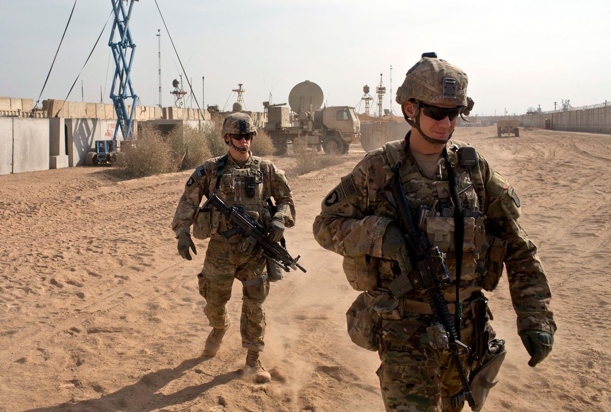 FILE - In this Nov. 9, 2016 file photo, U.S. Army soldiers move through Qayara West Coalition base in Qayara, some 50 kilometers south of Mosul, Iraq. Reverberations from President Donald Trump’s travel ban and other stances are threatening to undermine future U.S.-Iraqi security cooperation, rattling a key alliance that over the past two years has slowly beaten back the Islamic State group. Iraq’s prime minister, Haider al-Abadi, has sought to contain public anger sparked by the ban and by Trump’s repeated statements that the Americans should have taken Iraq’s oil, as well as his hard line against Iran, a close ally of Baghdad. (AP Photo/Marko Drobnjakovic, File) (AP)