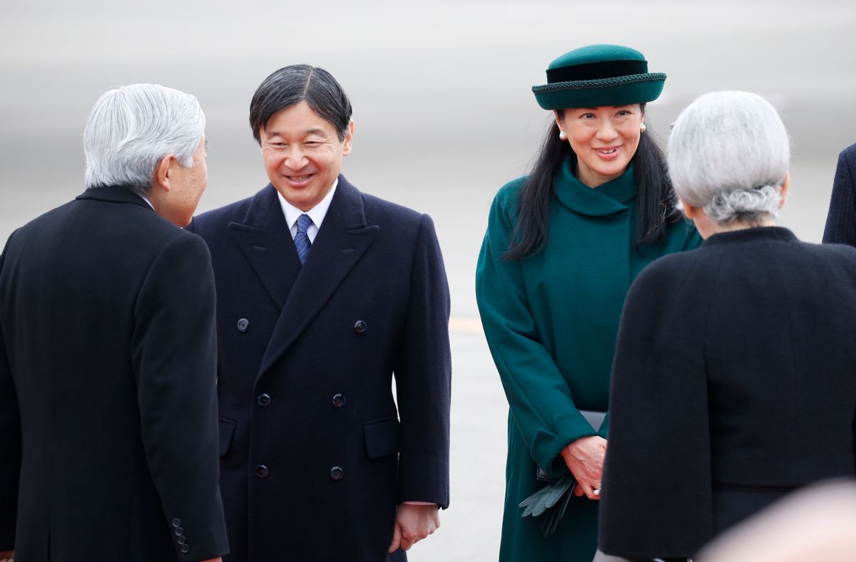 Japan's Emperor Akihito and Empress Michiko are greeted by Crown Prince Naruhito, left rear, and Crown Princess Masako, right rear, as they prepare to leave for Vietnam at the Haneda International Airport in Tokyo, Tuesday, Feb. 28, 2017. (AP Photo/Shizuo Kambayashi) (AP)