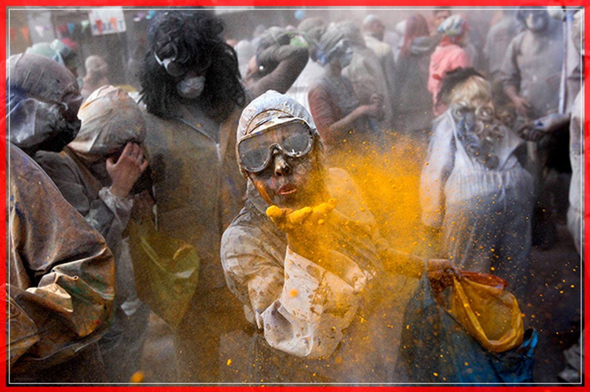 Revellers celebrate "Ash Monday" by participating in a colourful "flour war", a traditional festivity marking the end of the carnival season and the start of the 40-day Lent period until the Orthodox Easter,in the port town of Galaxidi, Greece, February 27, 2017. REUTERS/Alkis Konstantinidis - RTS10N6B (Reuters)