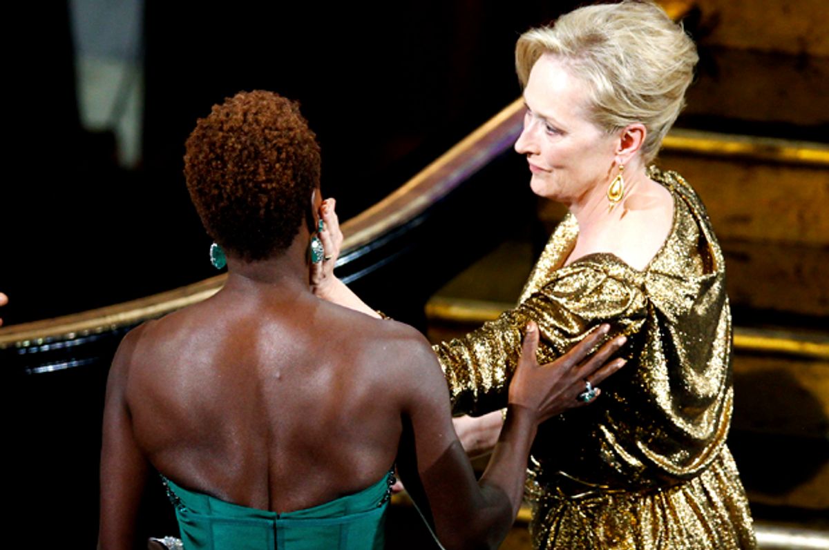 Meryl Streep, winner of the Oscar for best actress for her role in "The Iron Lady" is congratulated by fellow nominee Viola Davis   (Reuters/Gary Hershorn)