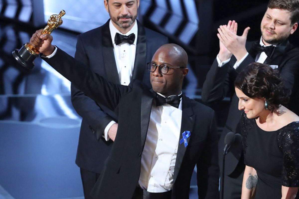 Barry Jenkins of "Moonlight" holds up the Best Picture Oscar at the 89th Academy Awards in Los Angeles.   (Reuters/Lucy Nicholson)