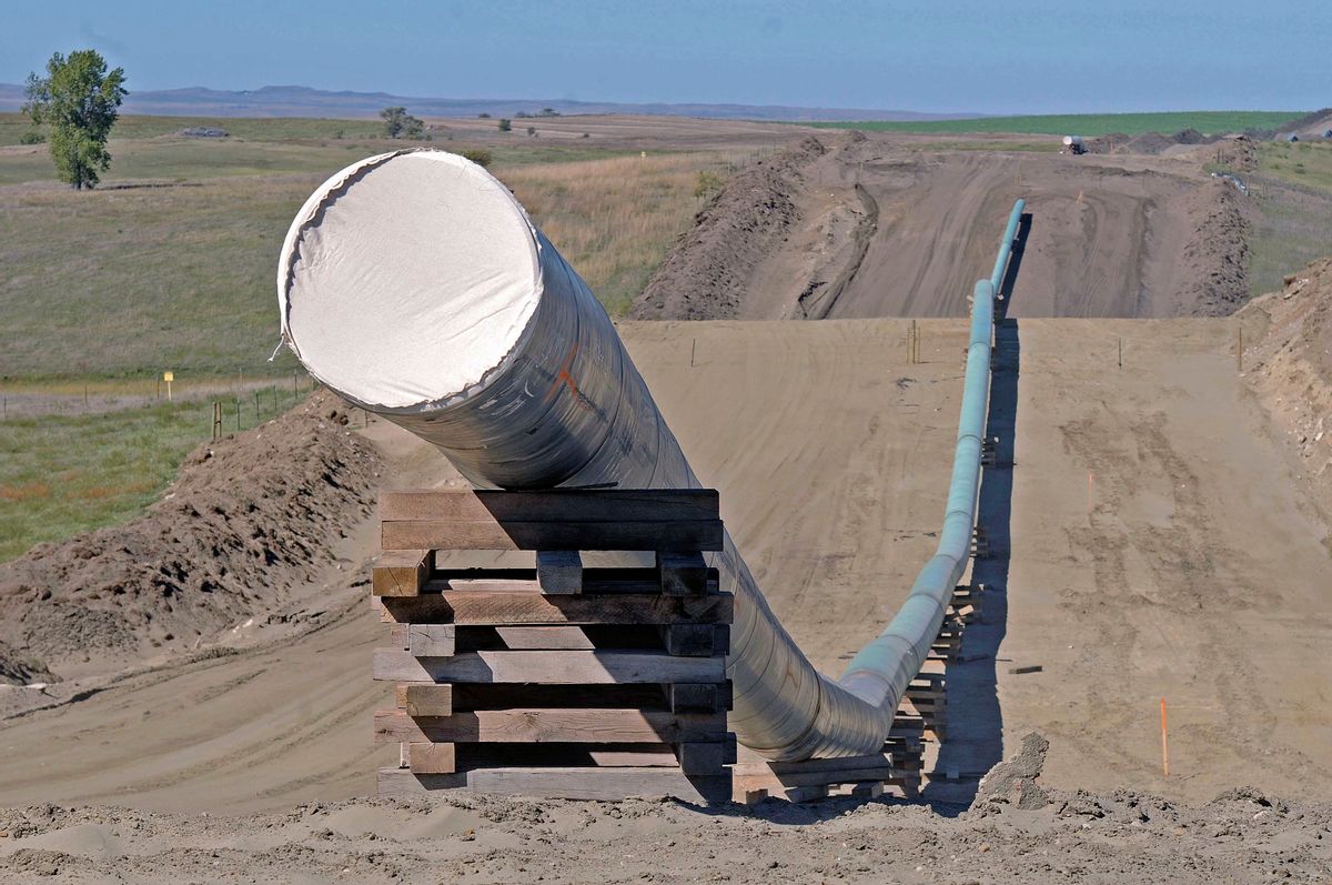 FILE - This Sept. 29, 2016, file photo, shows a section of the Dakota Access Pipeline under construction near the town of St. Anthony in Morton County, N.D. The Army has notified Congress Tuesday, Feb. 7, 2017, that it will allow the $3.8 billion Dakota Access pipeline to cross under a Missouri River reservoir in North Dakota, completing the four-state project to move North Dakota oil to Illinois. The Army intends to allow the crossing under Lake Oahe as early as Wednesday, Feb. 8. The crossing is the final big chunk of work on the pipeline.  (Tom Stromme/The Bismarck Tribune via AP, File) (AP)