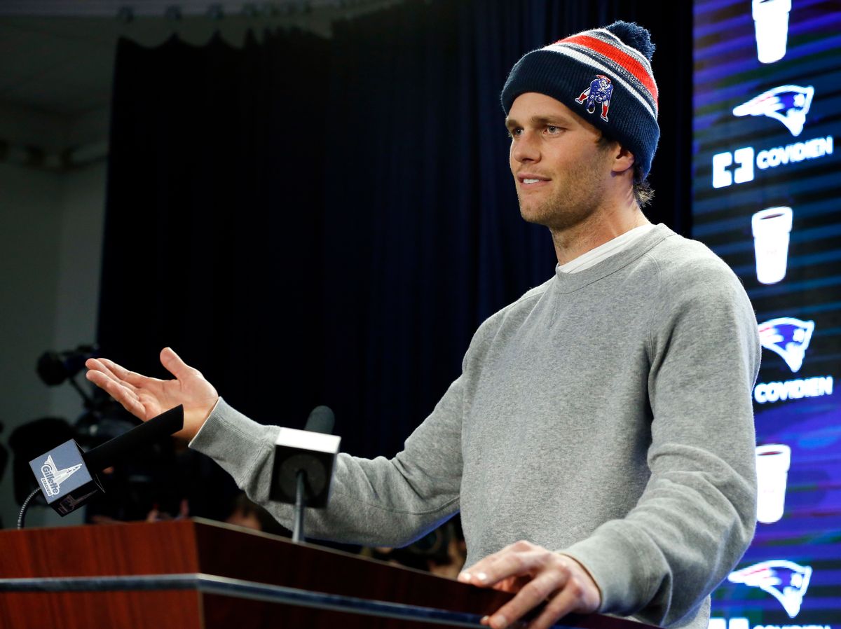 FILE - In this Jan. 22, 2015, file photo, New England Patriots quarterback Tom Brady speaks at a news conference in Foxborough, Mass. Brady did not attend a 2015 celebration at the White House because of what the he insisted was a "family commitment" but others speculated was because of some unflattering comments a spokesman for President Barack Obama made about the Deflategate scandal. (AP Photo/Elise Amendola, File) (Associated Press)