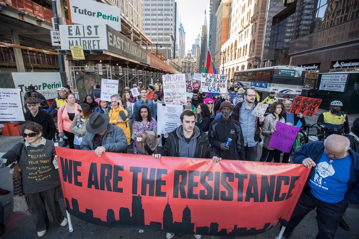 People march during a protest Monday, Feb. 20, 2017, in Philadelphia. Thousands of demonstrators turned out Monday across the U.S. to challenge Donald Trump in a Presidents Day protest dubbed Not My President's Day. (Michael Bryant/The Philadelphia Inquirer via AP) (AP)
