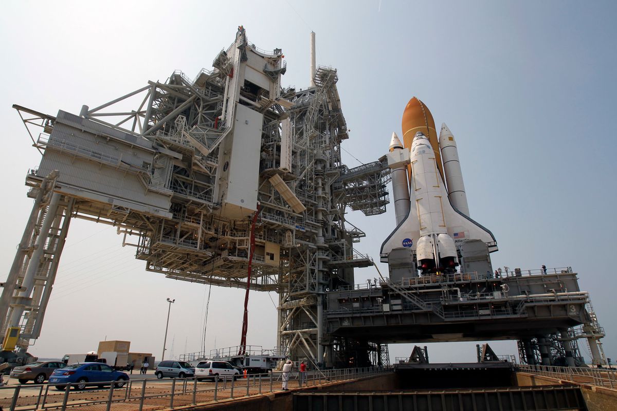 FILE - In this Friday, June 17, 2011 file photo, space shuttle Atlantis is mounted on Pad 39A at the Kennedy Space Center in Cape Canaveral, Fla. Dormant for nearly six years, Launch Complex 39A at NASA’s Kennedy Space Center should see its first commercial flight on Feb. 18, 2017. A SpaceX Falcon 9 rocket will use the pad to hoist supplies for the International Space Station. (AP Photo/John Raoux) (AP)