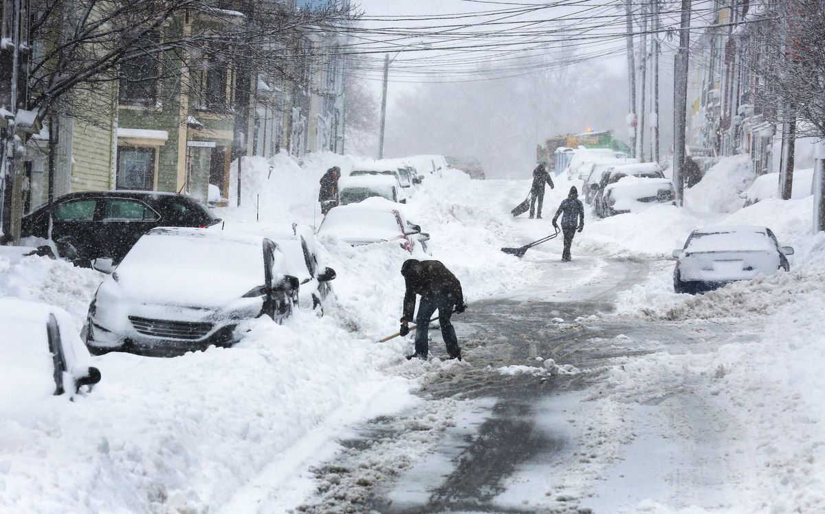 Residents shovel Wednesday, Feb. 15, 2017, in St. John's, Newfoundland and Labrador. (Paul Daly/The Canadian Press via AP) (AP)