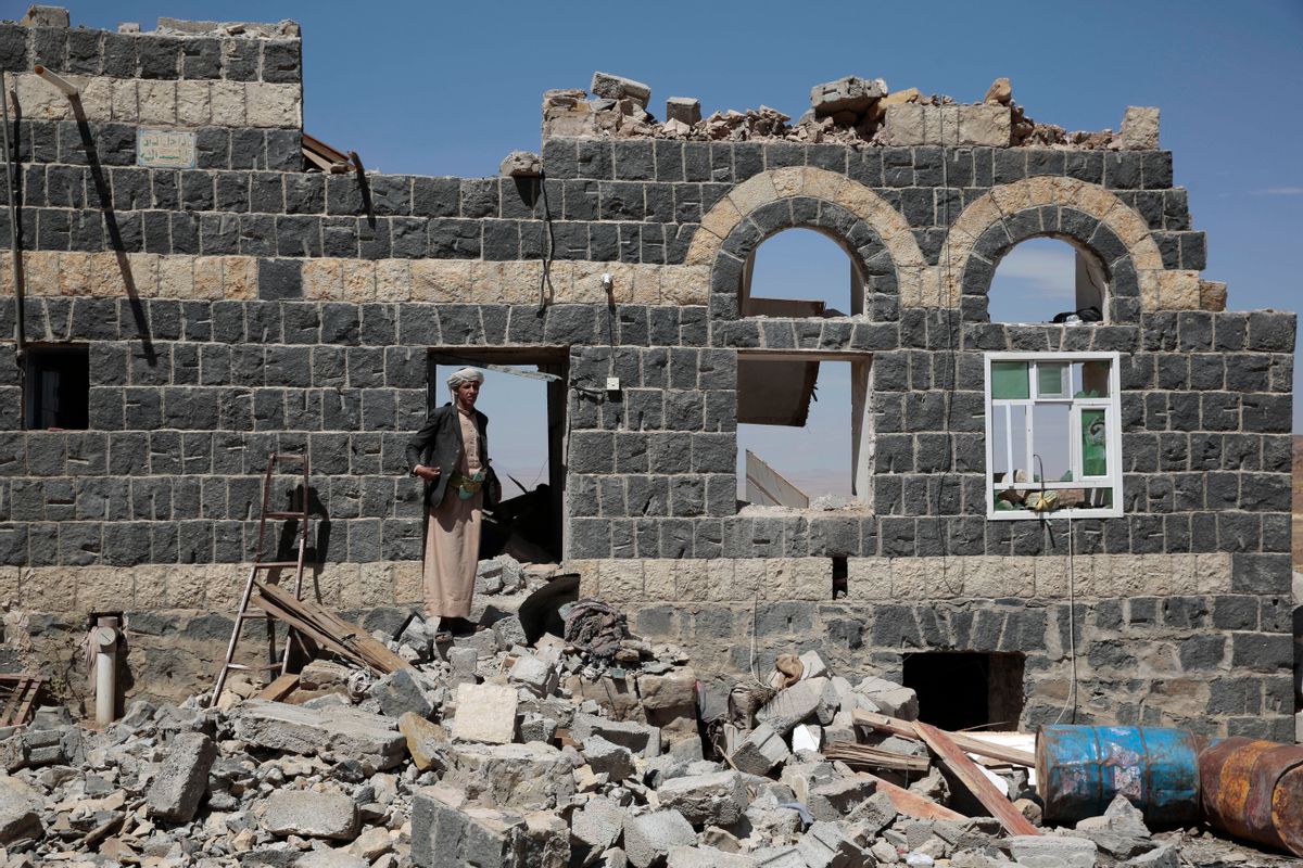 A man stands on the rubble of a house destroyed by a Saudi-led airstrike in the outskirts of Sanaa, Yemen, Thursday, Feb. 16, 2017. At least one Saudi-led airstrike near Yemen's rebel-held capital killed at least five people on Wednesday, the country's Houthi rebels and medical officials said. (AP Photo/Hani Mohammed) (AP)