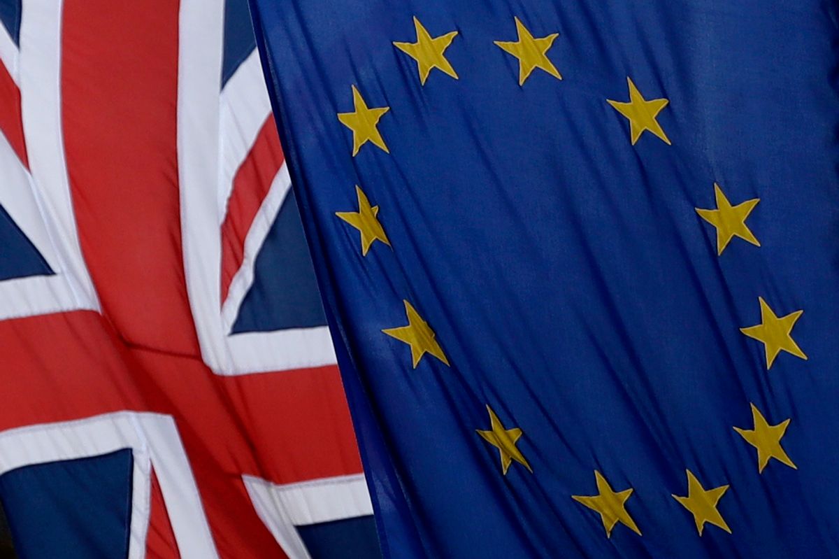 A European and British Union flags hang outside Europe House, the European Parliament's British offices, in London, Tuesday, March 14, 2017.  (AP Photo/Matt Dunham)