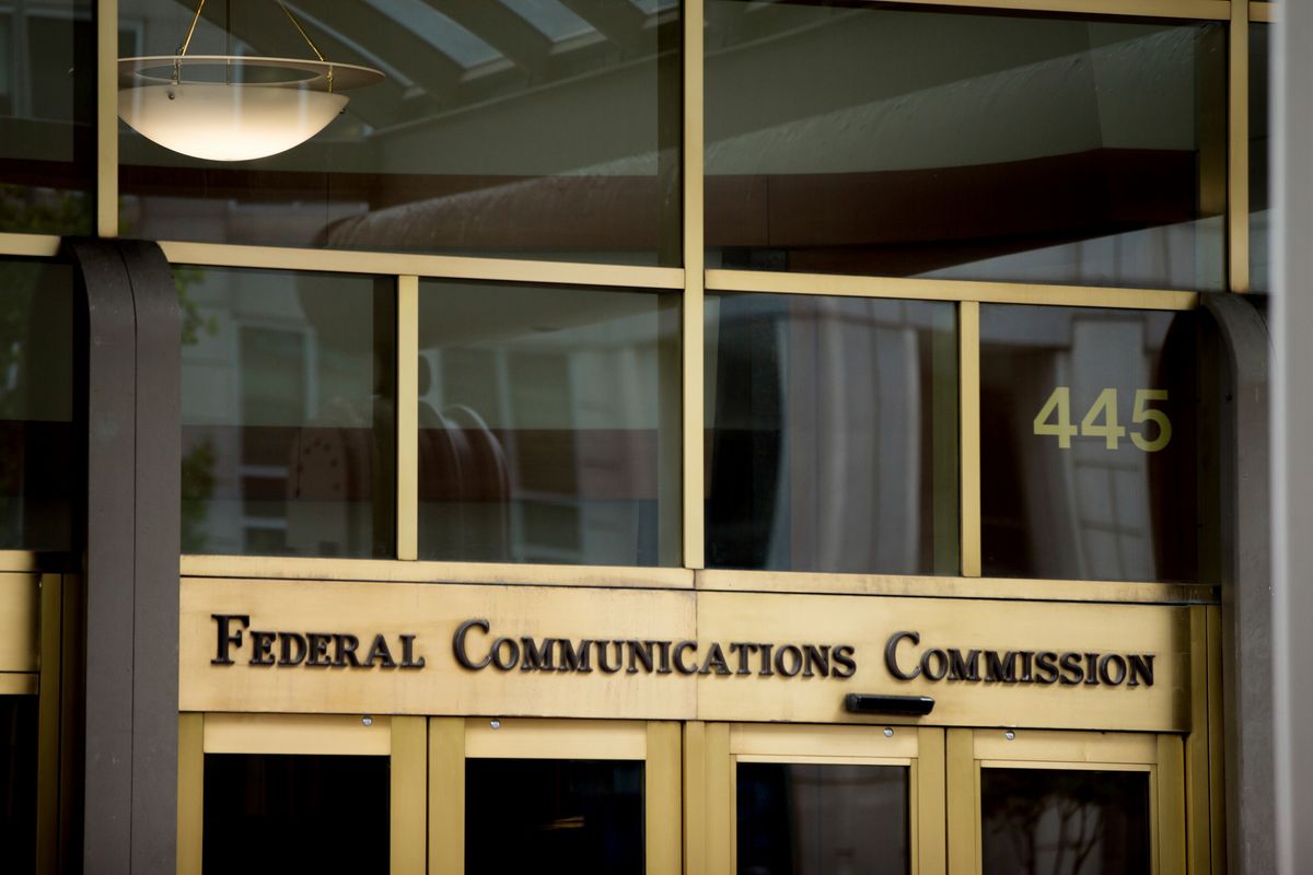 FILE - This June 19, 2015, file photo, shows the Federal Communications Commission building in Washington. Trumpism is slowly taking hold on your phone and computer, as the FCC starts rolling back Obama-era measures, known as "net neutrality" rules, which were designed to keep phone and cable giants from favoring their own internet services and apps. President Donald Trump’s hand-picked FCC chief, Ajit Pai, wants to cut regulations that he believes are holding back faster, cheaper internet. (AP Photo/Andrew Harnik, File) (AP)
