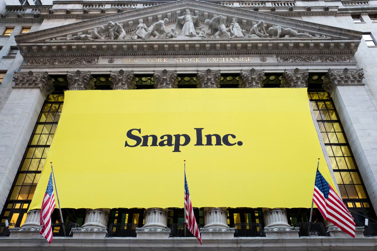 A banner for Snap Inc. hangs from the front of the New York Stock Exchange, Thursday, March 2, 2017, in New York. The company behind the popular messaging app Snapchat is expected to start trading Thursday after a better-than-expected stock offering. (AP Photo/Mark Lennihan) (AP)