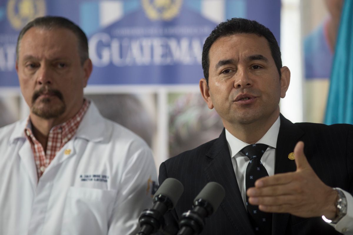 Guatemala's President Jimmy Morales speaks during a news conference in the lobby of the Roosevelt Hospital following a visit with family and victims of the youth shelter fire, in Guatemala City, Friday, March 10, 2017. (AP Photo/Luis Soto) (AP)