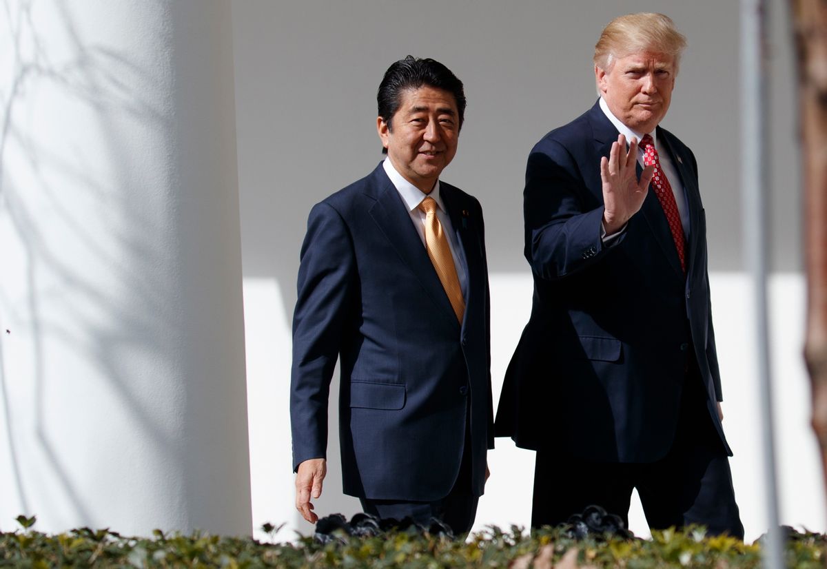 FILE - In this Feb. 10, 2017, file photo, Japanese Prime Minister Shinzo Abe, left, and U.S. President Donald Trump walk together to a news conference at the White House in Washington. (AP Photo/Evan Vucci, File)
