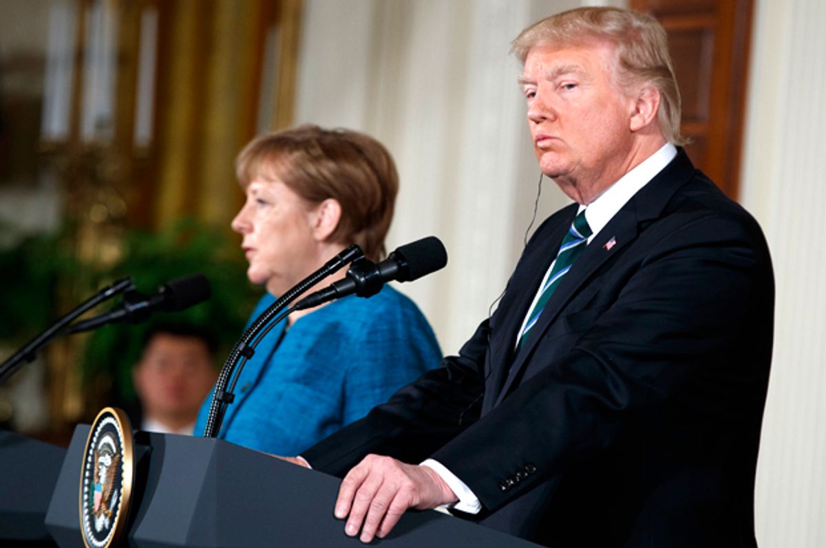 Donald Trump looks and Angela Merkel at a news conference in the White House, March 17, 2017.   (AP/Evan Vucci)