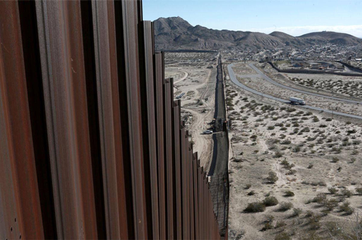 A truck drives near the Mexico-US border fence   (AP/Christian Torres)