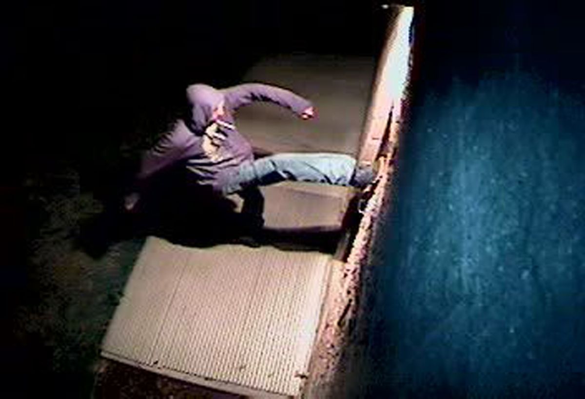 In this Sunday, March 26, 2017, still image from a video surveillance camera, a suspect is shown during the vandalizing of a mosque near Colorado State University in Fort Collins, Colo. (Fort Collins Police Department via AP)