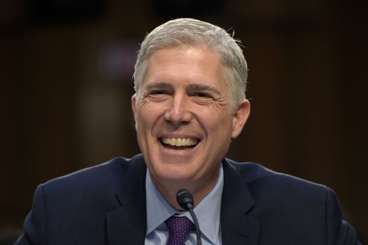 Supreme Court Justice nominee Neil Gorsuch smiles as he testifies on Capitol Hill in Washington, Tuesday, March 21, 2017, during his confirmation hearing before the Senate Judiciary Committee. (AP Photo/Susan Walsh) (AP Photo/Susan Walsh)