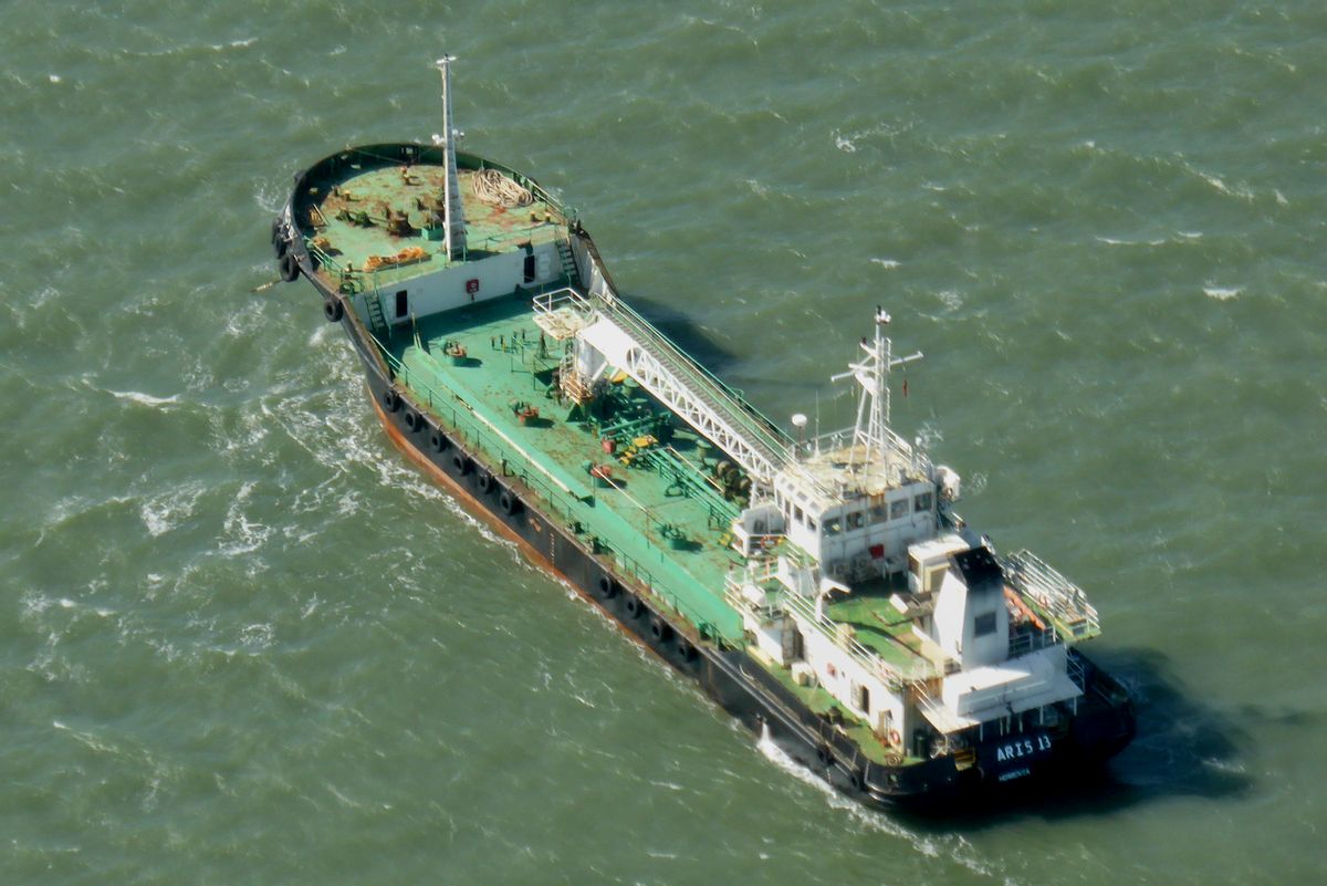 In this photo taken Monday, Oct. 27, 2014, the Aris 13 oil tanker is seen from a helicopter in the harbor of Gladstone, Australia.  (Kevin Finnigan/Tropic Maritime Images via AP) (AP)