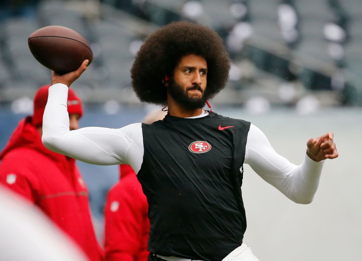 FILE - In this Dec. 4, 2016, file photo, San Francisco 49ers quarterback Colin Kaepernick warms up before an NFL football game against the Chicago Bears. Spike Lee said on Instagram Sunday, March 19, 2017, that it was "fishy" that Kaepernick, now a free agent, hadn't been signed." (AP Photo/Charles Rex Arbogast, File) (AP)