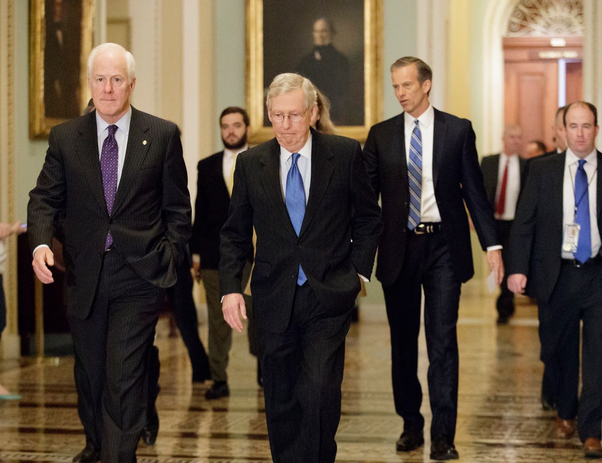 From left, Senate Majority Whip John Cornyn, R-Texas, Senate Majority Leader Mitch McConnell, R-Ky., and Sen. John Thune, R-S.D., walk to meet with reporters on Capitol Hill before President Donald Trump's speech to the nation, in Washington, Tuesday, Feb. 28, 2017. (AP Photo/J. Scott Applewhite) (AP)