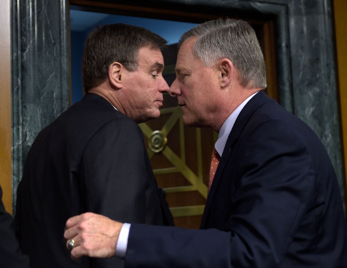 Senate Intelligence Committee Chairman Sen. Richard Burr, R-N.C., right, and the Committee's Vice Chairman Sen. Mark Warner, D-Va., stand up to leave on Capitol Hill in Washington, Thursday, March 30, 2017, following the committee's hearing on Russian intelligence activities. (AP Photo/Susan Walsh) (AP)