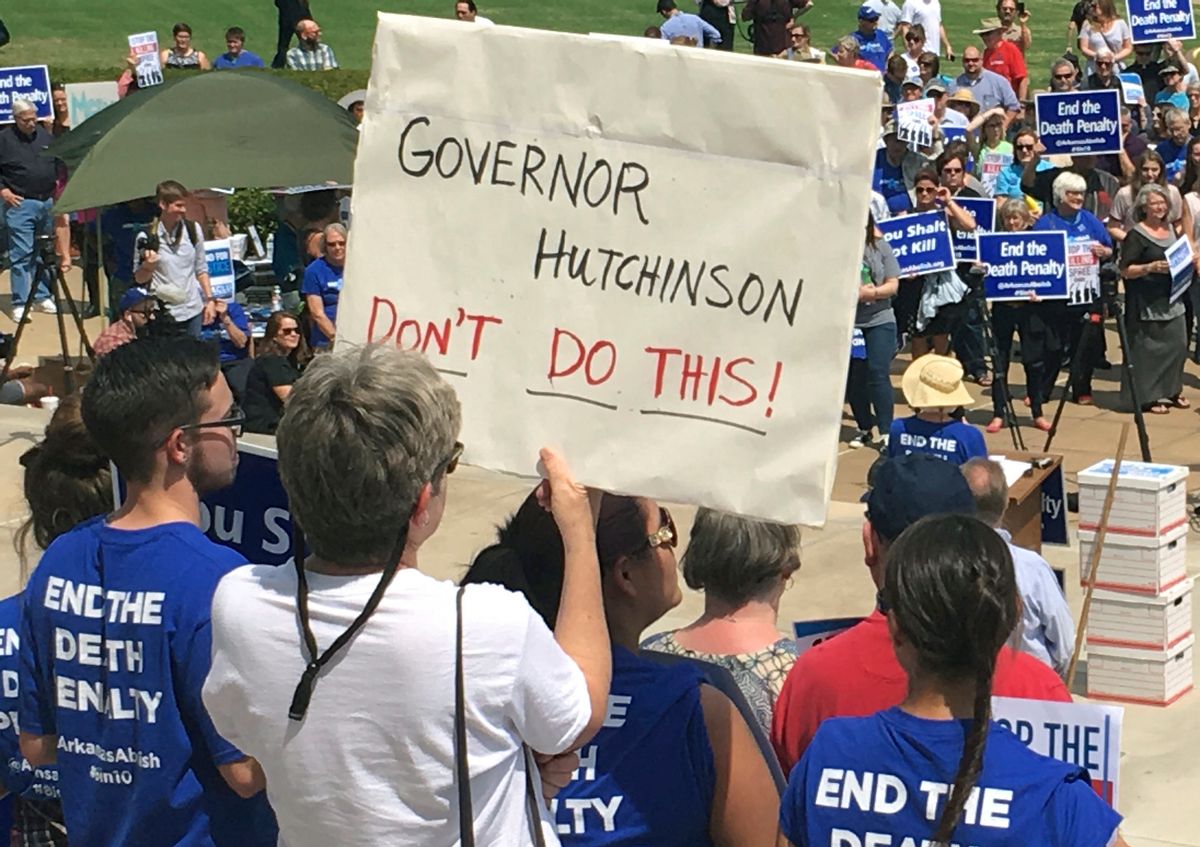 Protesters gather outside the state Capitol building on Friday, April 14, 2017, in Little Rock, Ark., to voice their opposition to Arkansas' seven upcoming executions. () (AP Photo/Kelly P. Kissel)