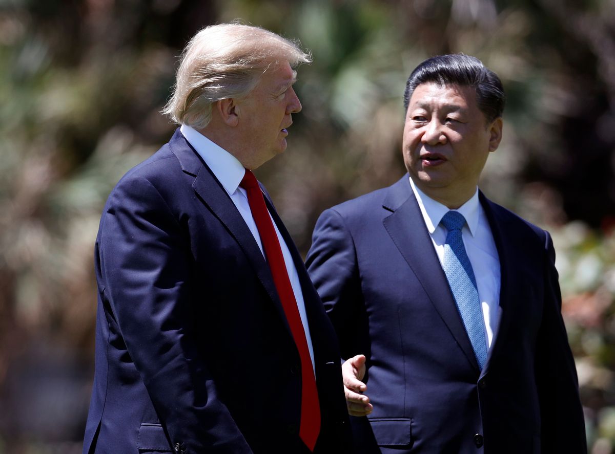 FILE - In this April 7, 2017 file photo, President Donald Trump, left, and Chinese President Xi Jinping walk together after their meetings at Mar-a-Lago, in Palm Beach, Fla.   China says President Xi has stressed the need for an end to North Korea's nuclear weapons program in a phone discussion with Trump that followed tweets from the U.S. president urging China to play a more active role. Xi told Trump that China insists on peace and stability on the Korean Peninsula and advocates resolving the problem through peaceful means. He said China would maintain "communication and coordination" with Washington over it. The two leaders spoke Tuesday night, April 11, 2017, Washington time. (AP Photo/Alex Brandon, File) (AP)
