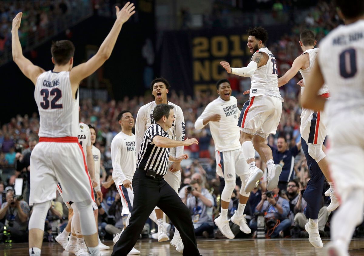 Gonzaga players celebrate after the semifinals of the Final Four NCAA college basketball tournament  (AP)