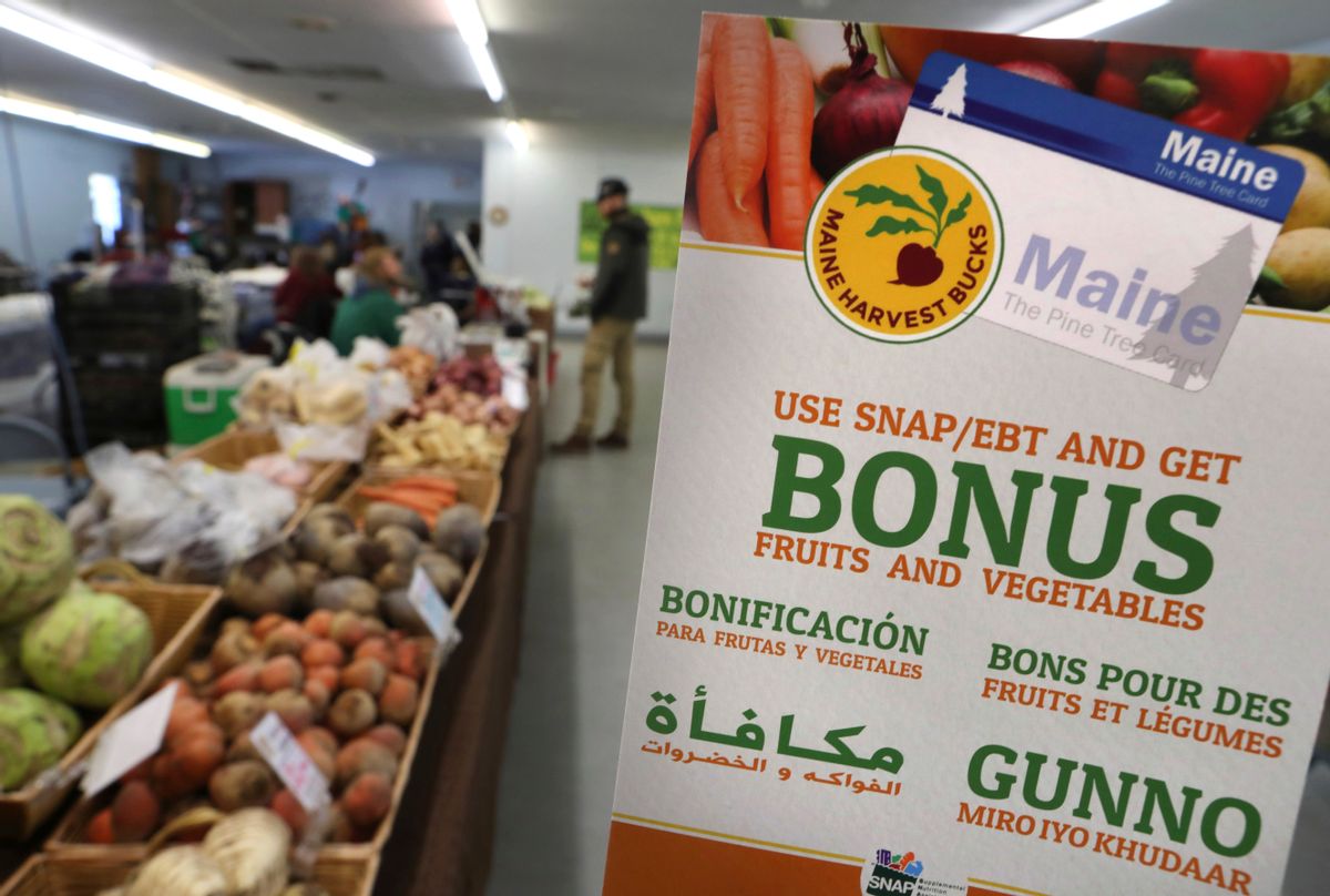 In this Friday, March 17, 2017 photo a sign advertises a program that allows food stamp recipients to use their EBT cards to shop at a farmer's market in Topsham, Maine. (AP Photo/Robert F. Bukaty) (AP)