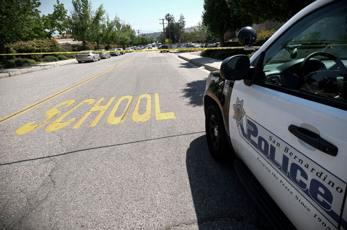 A police car is seen outside North Park School after a shooting, April 10, 2017, in San Bernardino, Calif.   (AP/Ringo H.W. Chiu)