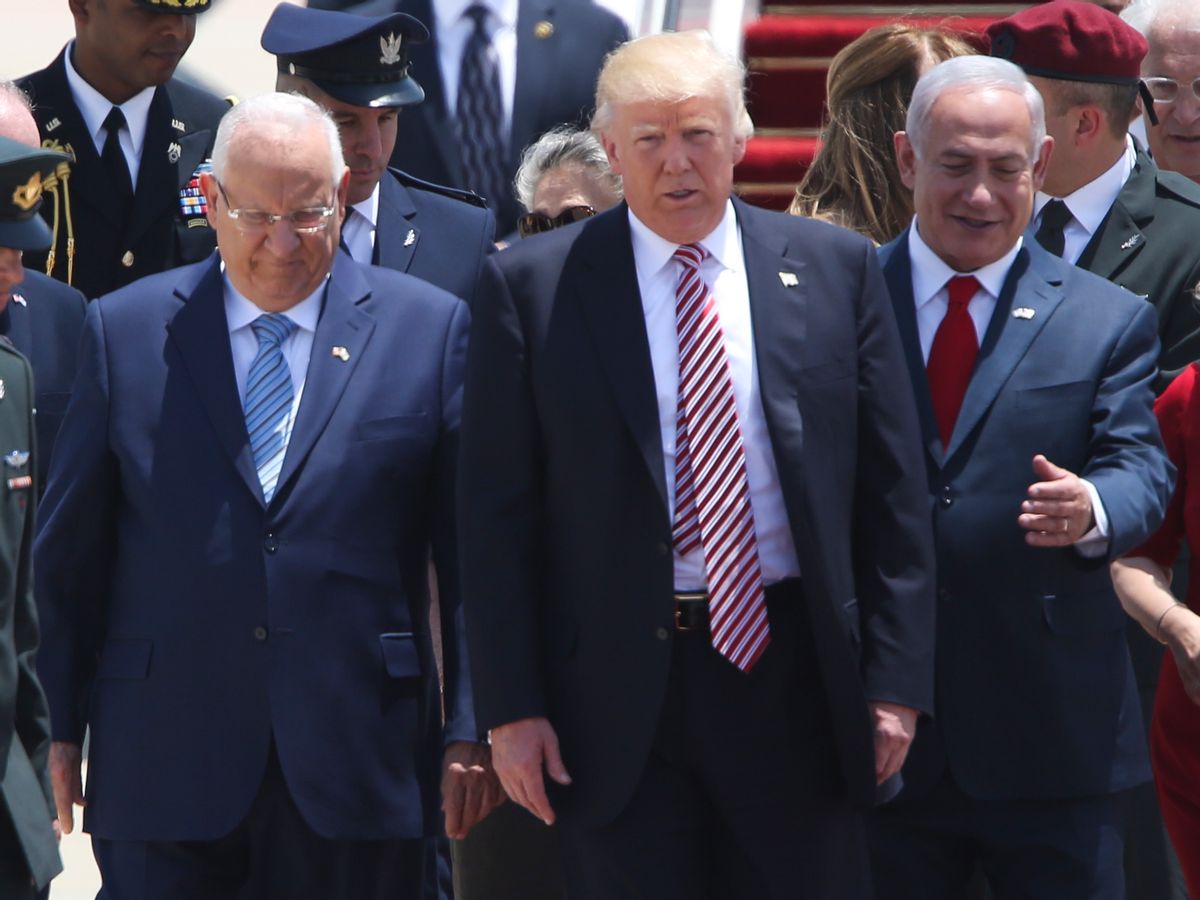 US President Donald Trump walks on his arrival accompanied by the Israeli President Rueben Rivlin, right, and Prime Minister Benjamin Netanyahu in Tel Aviv, Monday, May 22,2017. (AP Photo/Oded Balilty) (AP)
