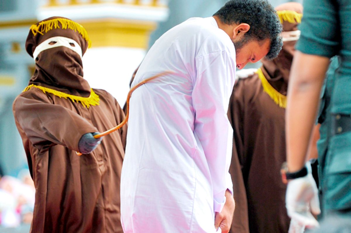 An Indonesian man being publicly caned. (Getty/Chaideer Mahyuddin)