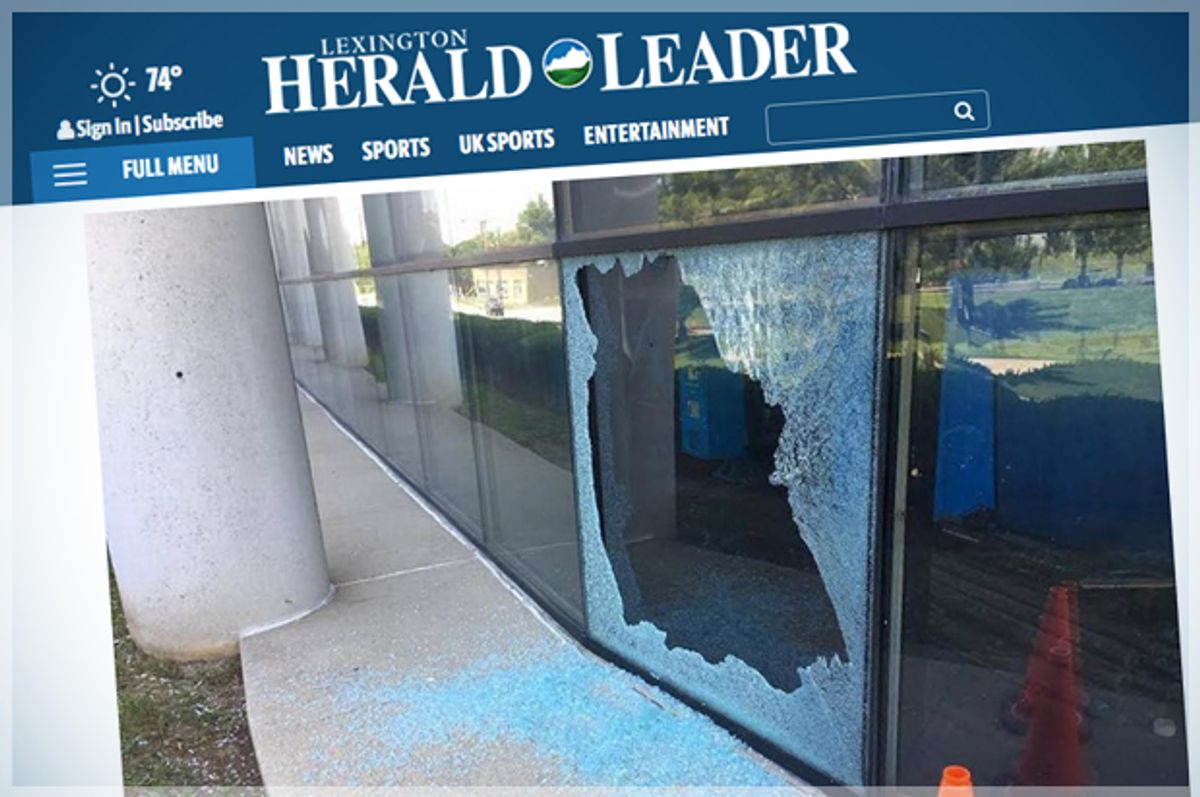 A shattered window at the Lexington Herald-Leader building.   (Lexington Herald Leader/Screen Montage by Salon)