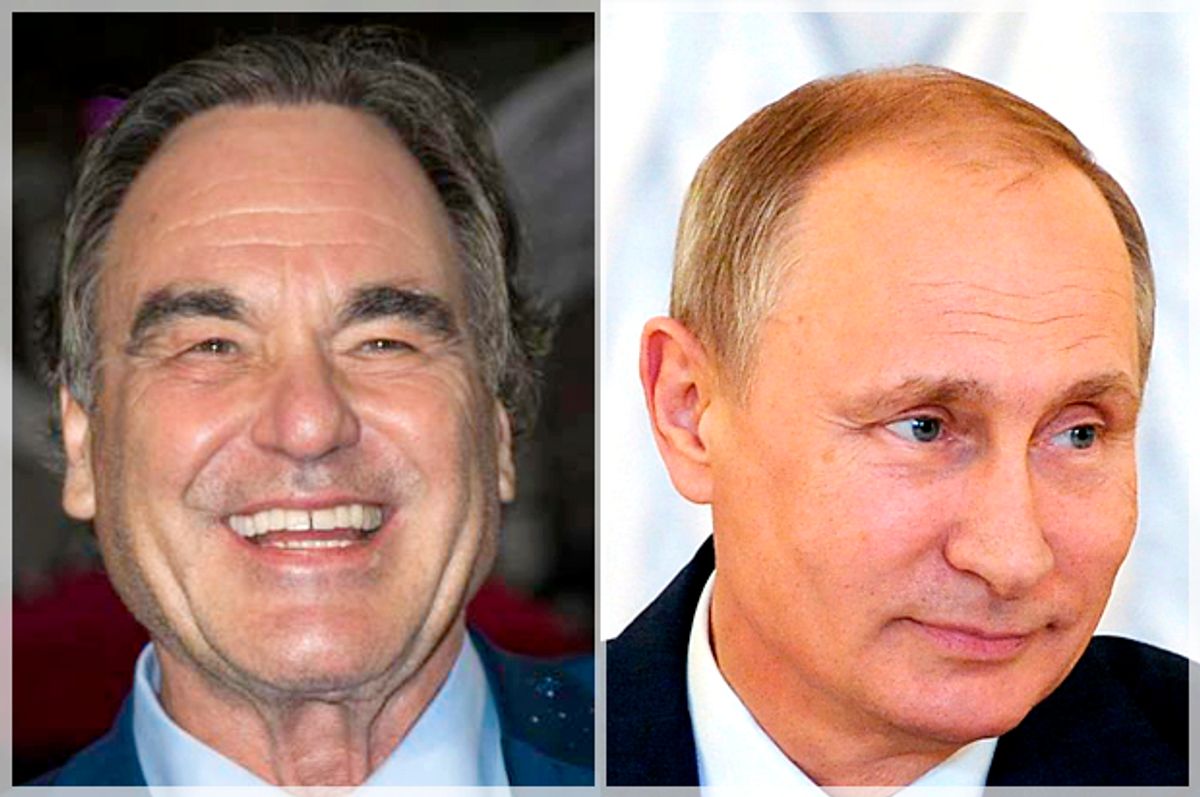 Oliver Stone; Vladimir Putin   (AP/Vianney Le Caer/Mikhail Klimentyev)