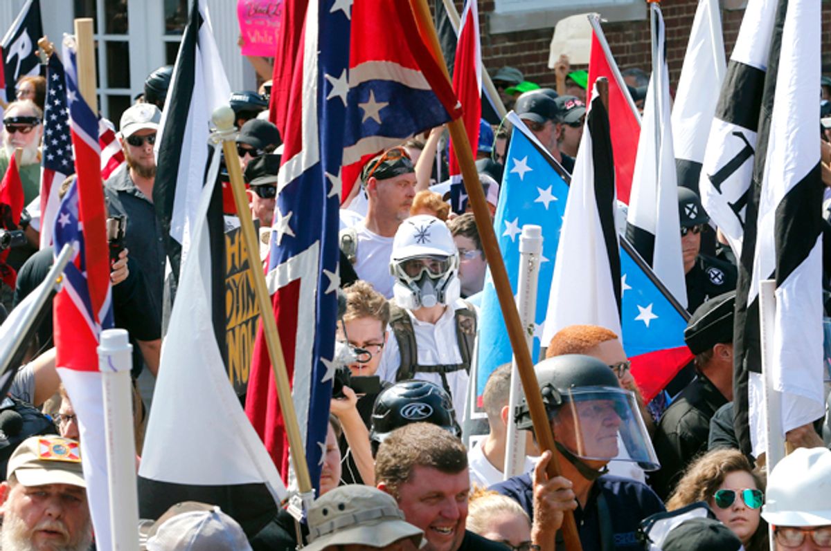 White nationalists walk into  Lee Park in Charlottesville, Va. (AP/Steve Helber)
