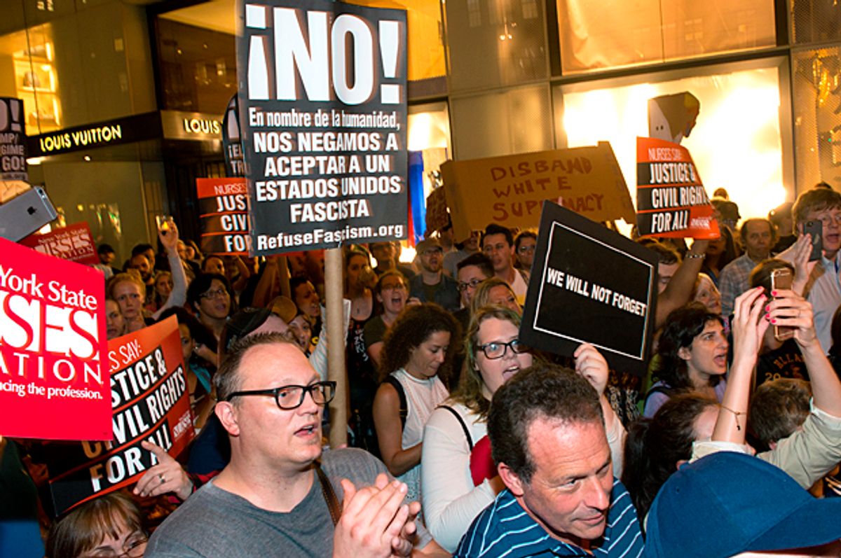 Michael Moore leads his Broadway audience to Trump Tower to protest Donald Trump (Getty/Noam Galai)