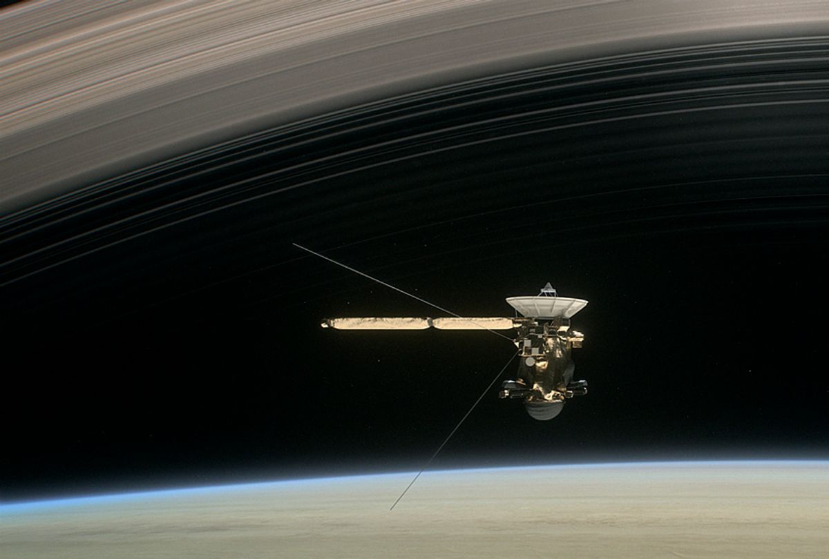 Cassini diving between Saturn and it's innermost ring. (AP/NASA)
