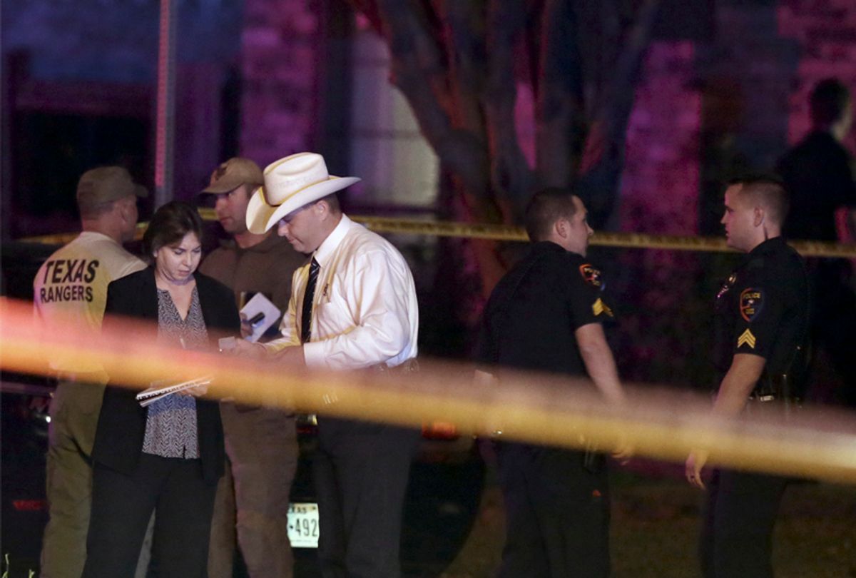 Law enforcement officers and investigators outside the scene of a shooting in Plano, Texas, Sept. 10, 2017.    (AP/LM Otero)