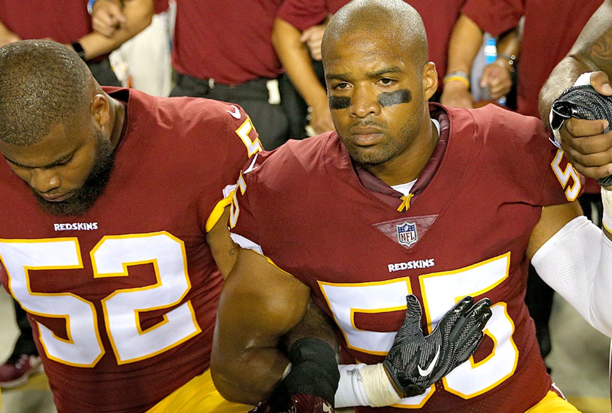 Chris Carter #55 of the Washington Redskins kneels during the national anthem, September 24, 2017 (Getty/Patrick Smith)