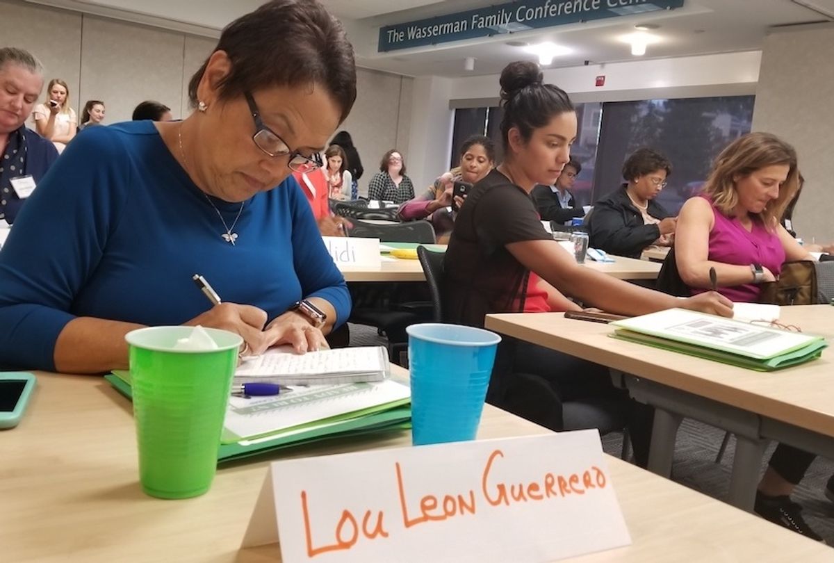 Lou Leon Guerrero (left) and Monica Chinchilla (center) were among 41 women from 12 states who participated in a bootcamp on Oct. 21 in Washington, D.C., held by Emerge America to help train them as candidates for 2018 and 2020. Guerrero is running for governor of Guam, while Chinchilla plans to run for the San Francisco Board of Education. (Kristian Hernández/Center for Public Integrity)