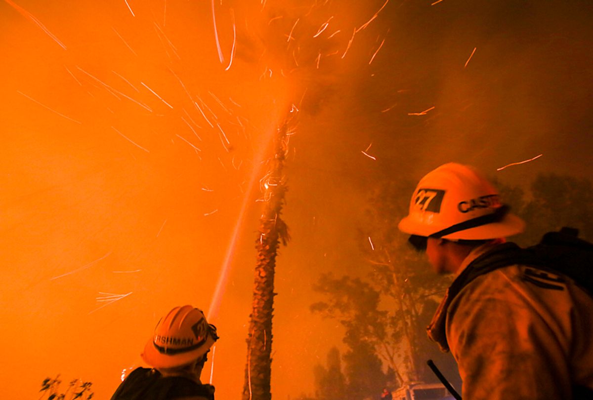 Firefighters battle a wildfire in Santa Paula, California, December 5, 2017 (Getty/Ringo Chiu)