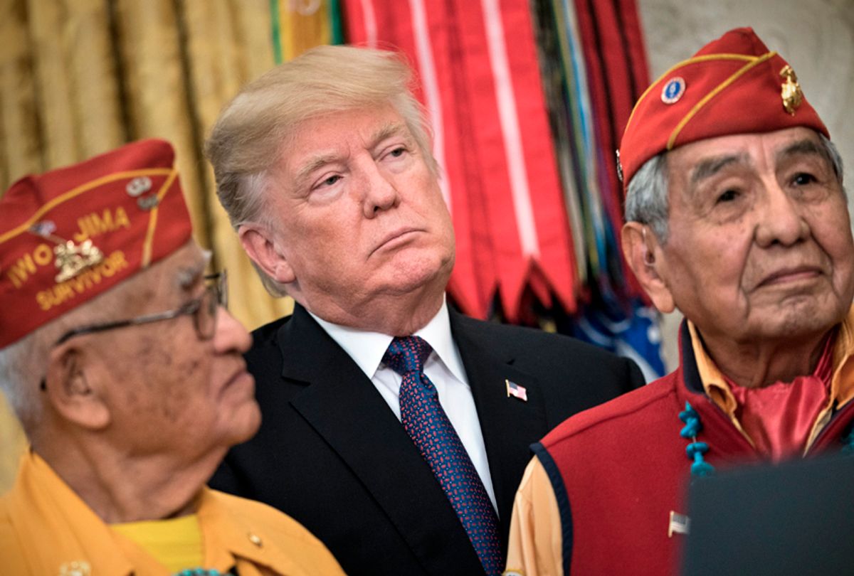 Donald Trump appears with Navajo Code Talkers in the White House during an event to honor Native American code talkers who served in World War II, November 27, 2017. (Getty/Brendan Smialowski)