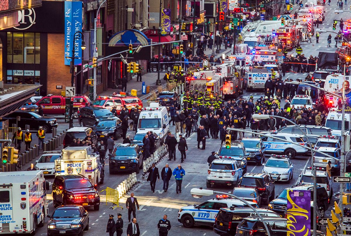 Law enforcement officials work following an explosion near New York's Times Square on Monday, Dec. 11, 2017 (AP/Andres Kudacki)