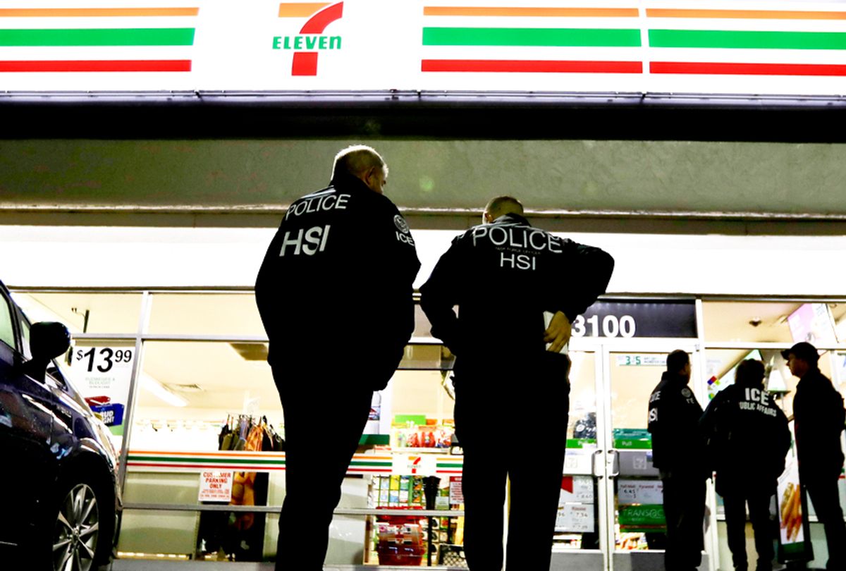 U.S. Immigration and Customs Enforcement agents serve an employment audit notice at a 7-Eleven store Jan. 10, 2018, in Los Angeles.  (AP/Chris Carlson)