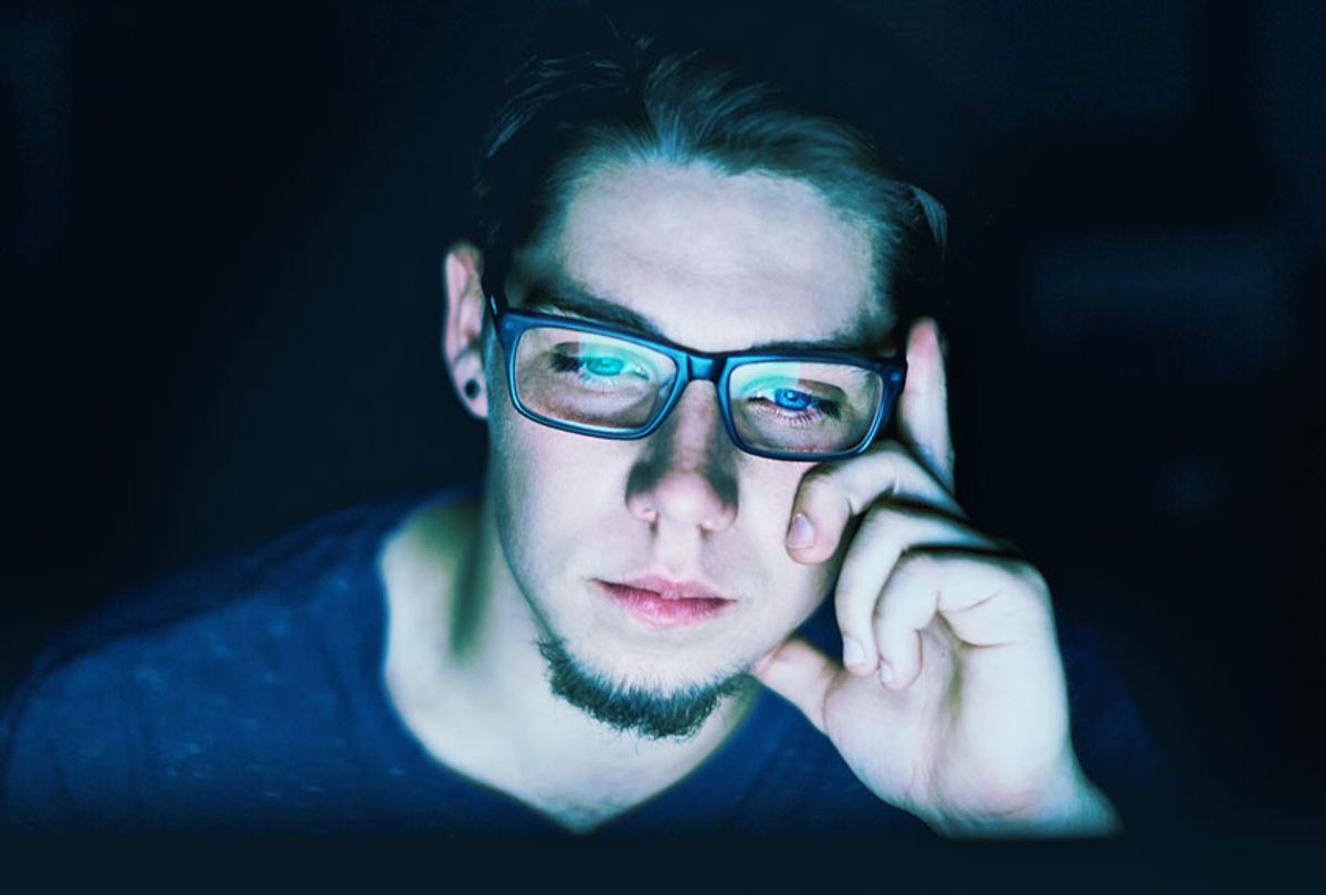 Man staring at computer screen (Getty Stock)