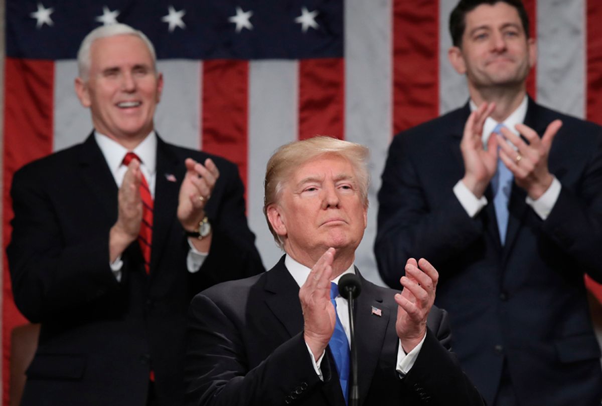 Donald Trump claps along with Mike Pence and Paul Ryan during the State of the Union address in the chamber of the U.S. House of Representatives, January 30, 2018. (Getty/Win McNamee)