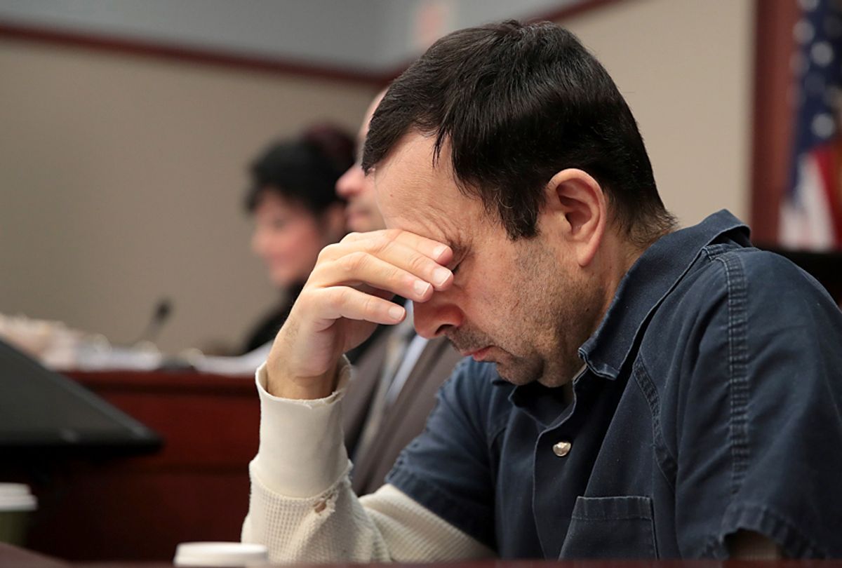 Larry Nassar listens to  victim impact statements during his sentencing hearing. (Getty/Scott Olson)